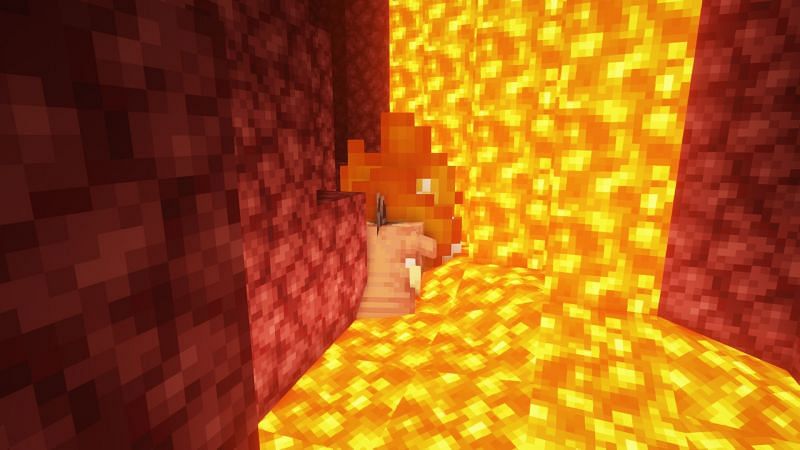 A hoglin burning in lava (Image via Minecraft)