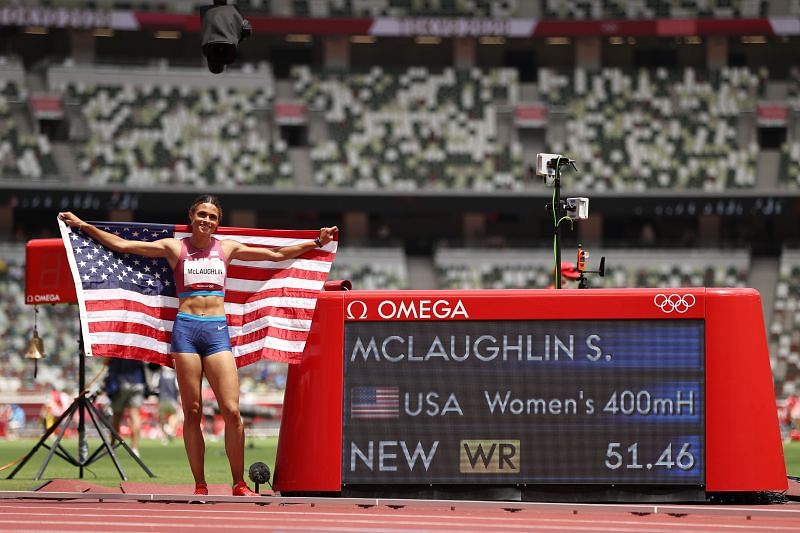 Sydney McLaughlin poses after creating a world record at the Tokyo Olympics.