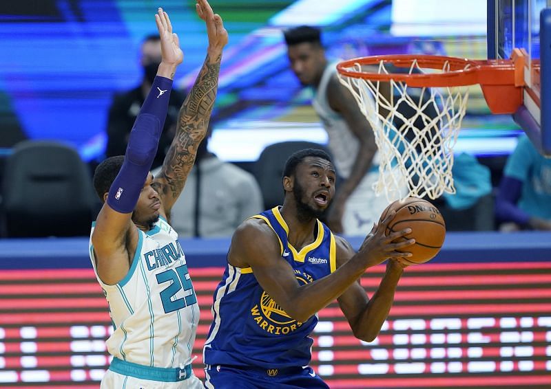 Andrew Wiggins (right) in action for the Golden State Warriors.