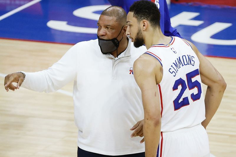 Head coach Doc Rivers of the Philadelphia 76ers speaks with Ben Simmons #25