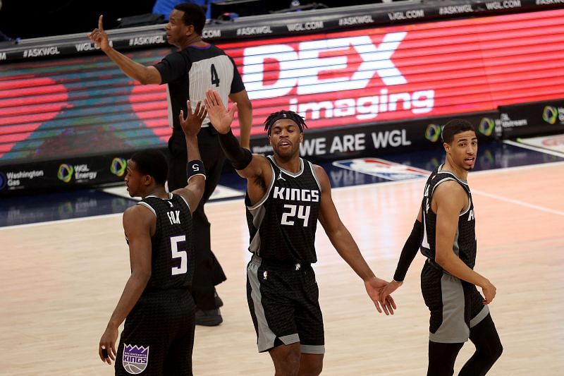 Sacramento Kings guards from left to right, De&rsquo;Aaron Fox, Buddy Hield and Tyrese Haliburton