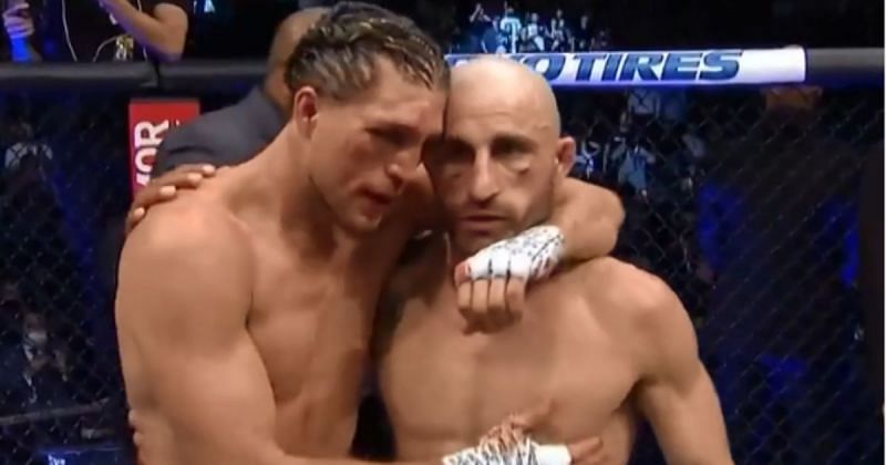 Brian Ortega (left) and Alexander Volkanovski (right) embrace after their UFC 266 main event [Photo Credit: screengrab from a video by @ufcbtsport on Instagram]