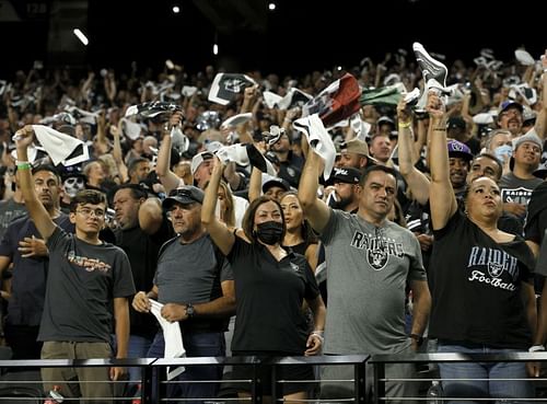 Las Vegas Raiders fans taking in their first home game in Las Vegas in attendance