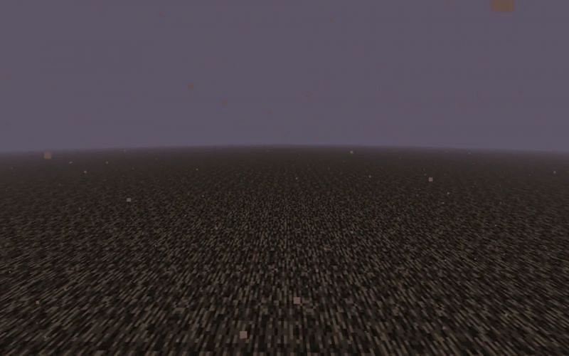 A screenshot was taken in Minecraft above the Nether&#039;s final layer of bedrock (Image via Minecraft)