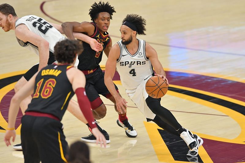 San Antonio Spurs guard Derrick White #4 and center Jakob Poeltl #25 in a pick-and-roll