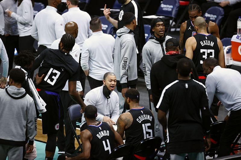 Head coach Tyronn Lue of the LA Clippers speaks with his team.