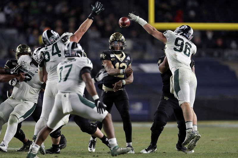 Former Wake Forest QB Jaime Newman plays in the New Era Pinstripe Bowl against Michigan State
