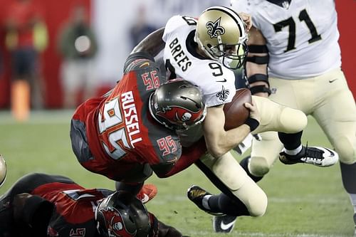 Ryan Russell of Tampa Bay Buccaneers sacks Drew Brees of New Orleans Saints 