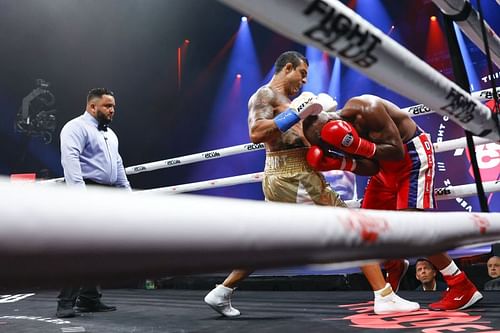 Vitor Belfort throws a punch against Evander Holyfield during the first round of their fight in Florida (Photo Credit: Getty Images)