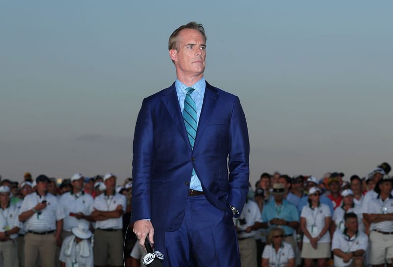 Joe Buck looks on during a golf tournament