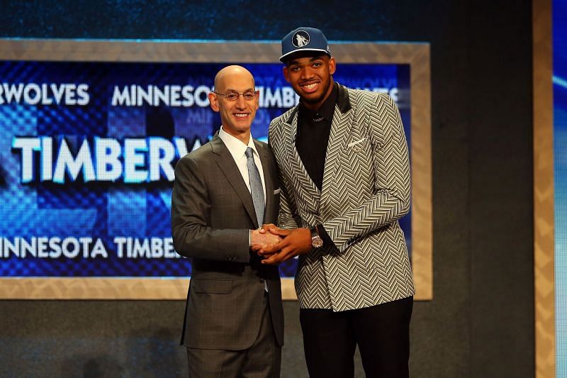 Karl-Anthony Towns poses with Commissioner Adam Silver after being drafted first overall by the Minnesota Timberwolves (Image via Getty Images)