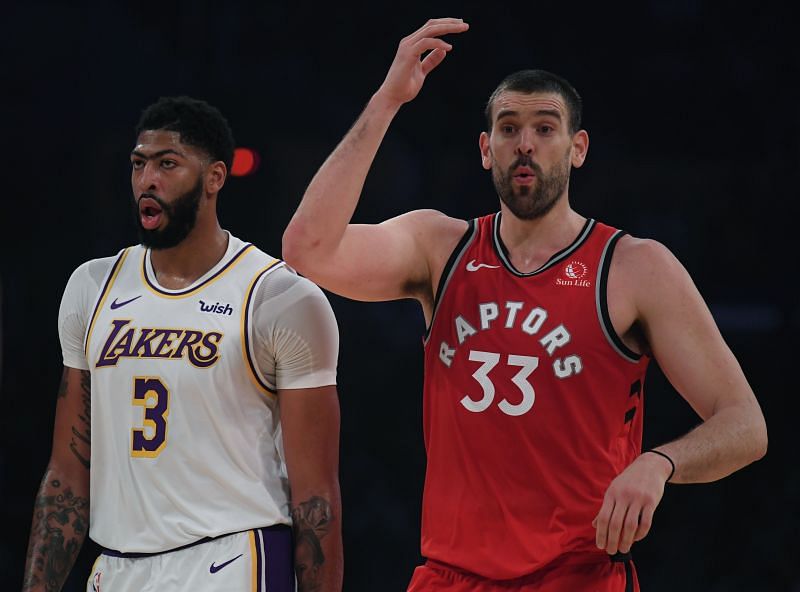 Marc Gasol #33 of the Toronto Raptors reacts to play in front of Anthony Davis #3 of the Los Angeles Lakers during a 113-104 Raptor win at Staples Center on November 10, 2019 in Los Angeles, California.