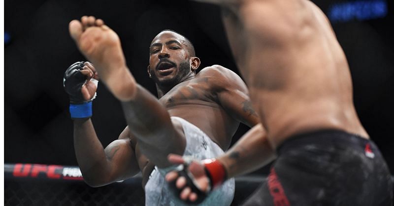 UFC light heavyweight fighter Khalil Rountree Jr. (left) executes a leg kick