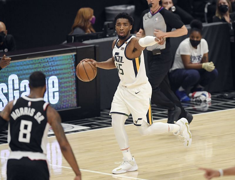 Donovan Mitchell #45 of the Utah Jazz dribbles the ball against Los Angeles Clippers during the first half in Game Six of the Western Conference second-round playoff series at Staples Center on June 18, 2021 in Los Angeles, California.