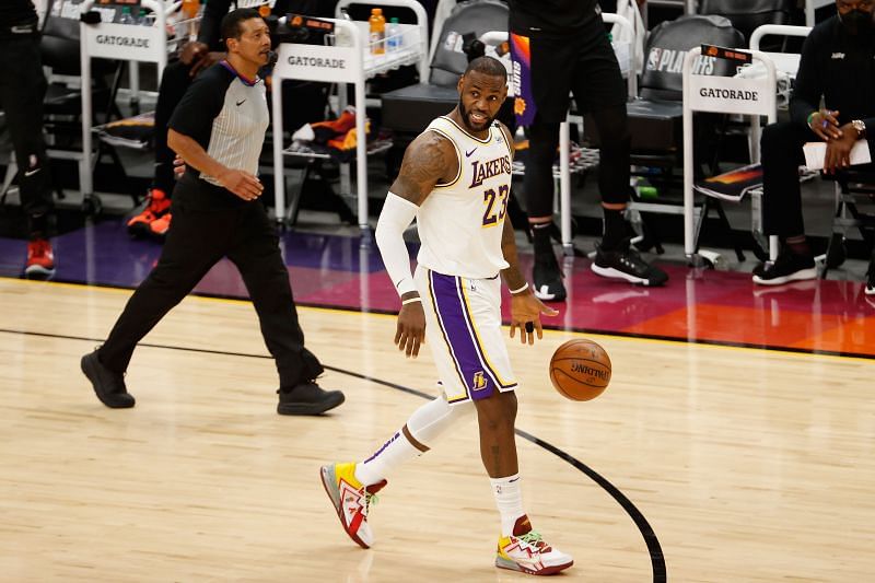 PHOENIX, ARIZONA - MAY 23: LeBron James #23 of the Los Angeles Lakers handles the ball against the Phoenix Suns during the first half of Game One of the Western Conference first-round playoff series at Phoenix Suns Arena on May 23, 2021 in Phoenix, Arizona.