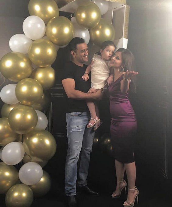 MS Dhoni with his wife and his daughter