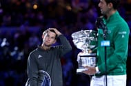 Thiem (L) and Djokovic at the 2020 Australian Open trophy presentation ceremony.