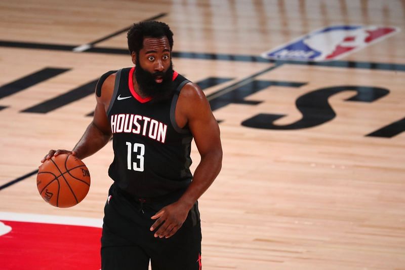 James Harden brings the ball up court for the Houston Rockets