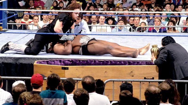 The Undertaker in a Casket Match against Kamala