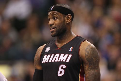 LeBron James looks on during an NBA game between the Miami Heat and Dallas Mavericks