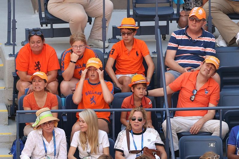 Dutch fans cheering in the stands at the Arthur Ashe Stadium.
