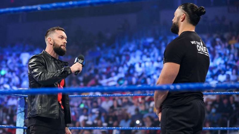 Finn Balor and Roman Reigns on SmackDown
