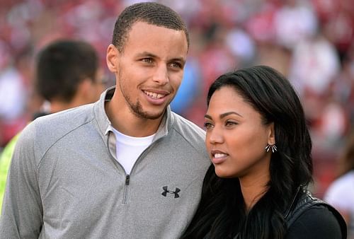 Steph Curry with his wife Ayesha Curry [Source: Bustle]