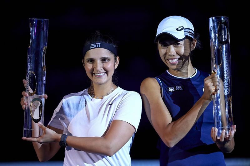 Sania Mirza (L) &amp; Zhang Shuai with the J&amp;T Banka Ostrava Open trophy