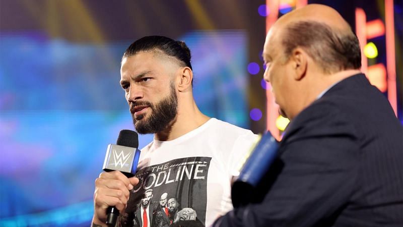 Roman Reigns and Paul Heyman share an intense moment together