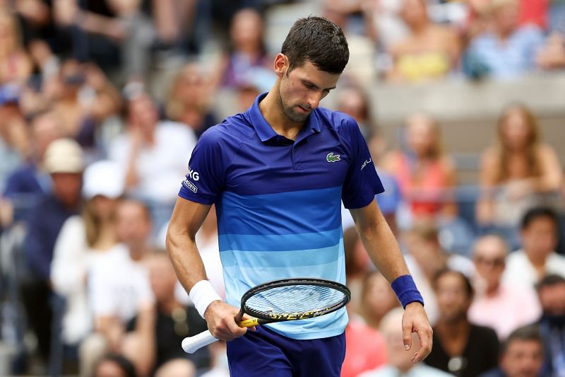 Novak Djokovic appears disappointed after a point