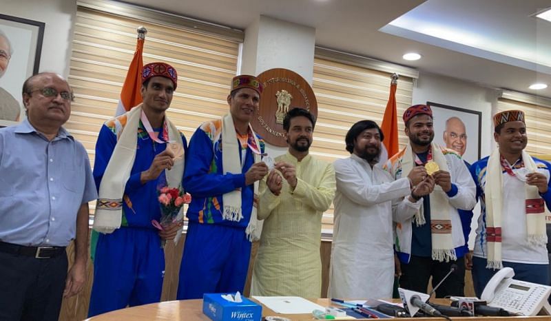 Indian 2021 Paralympic medallists along with Sports Minister Anurag Thakur.