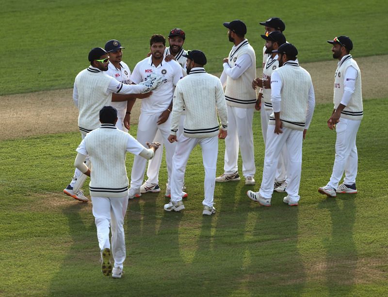 The Indian team celebrates the pivotal wicket of England skipper Joe Root, towards the end of Day One.