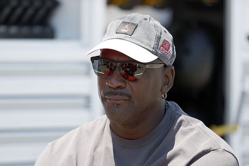 NBA Hall of Famer Michael Jordan and co-owner of 23XI Racing waits in the #23 DoorDash Toyota pit area prior to the NASCAR Cup Series Toyota/Save Mart 350 at Sonoma Raceway on June 06, 2021 in Sonoma, California.