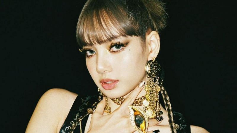 Lisa dishes on behind-the-scenes moments while reacting to 'LALISA' MV
