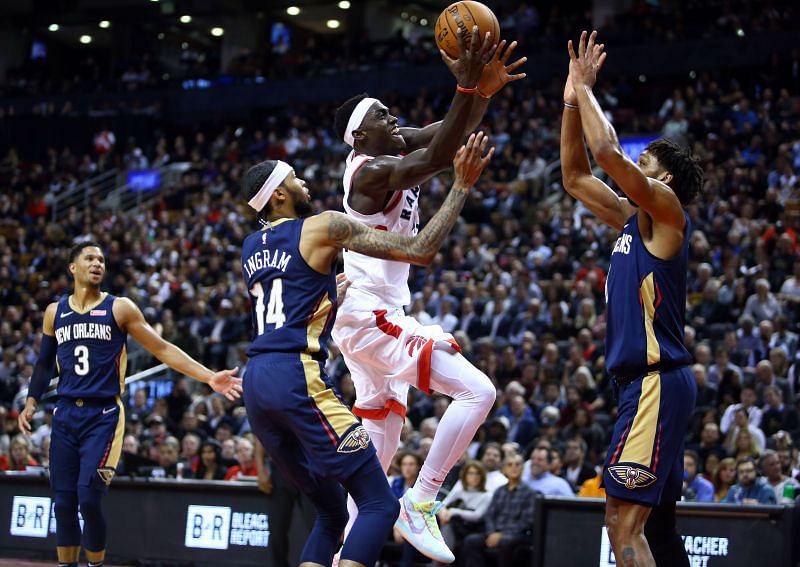 Brandon Ingram tries to defend Pascal Siakam during an NBA game.