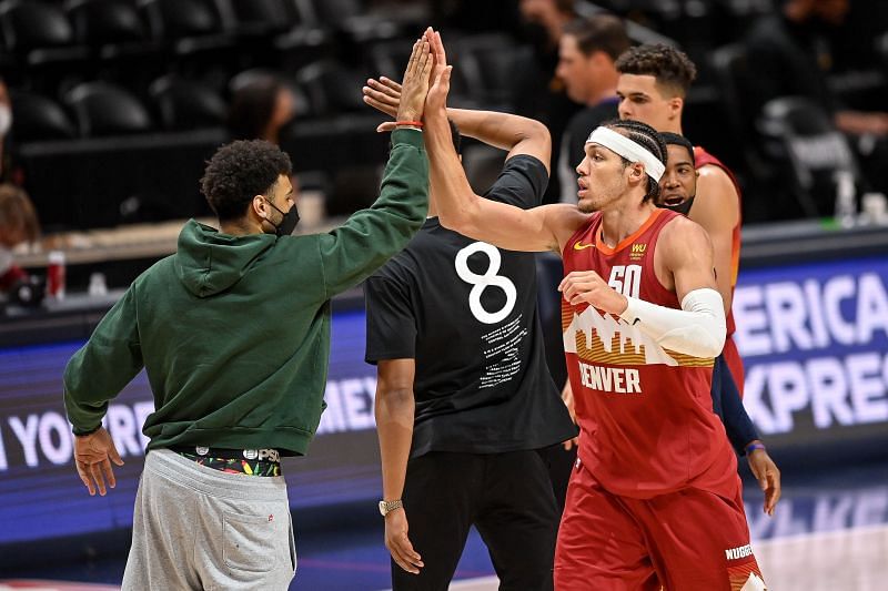 Aaron Gordon (#50) of the Denver Nuggets is congratulated by Jamal Murray (#27).