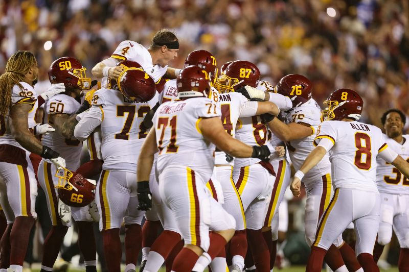 QB Taylor Heinicke celebrates with the Washington Football Team