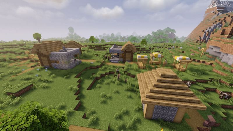 A village with two blacksmith houses (Image via Minecraft)