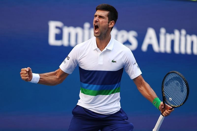 Novak Djokovic celebrates his win over Nishikori