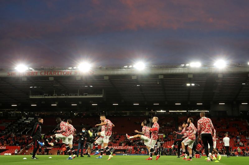 Manchester United players warm up ahead of their clash with West Ham.