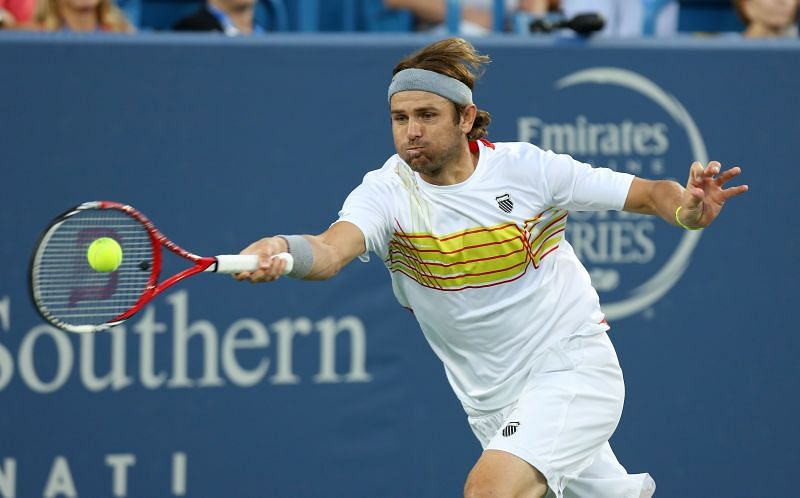 Mardy Fish in action against Roger Federer at the 2012 Western & Southern Open