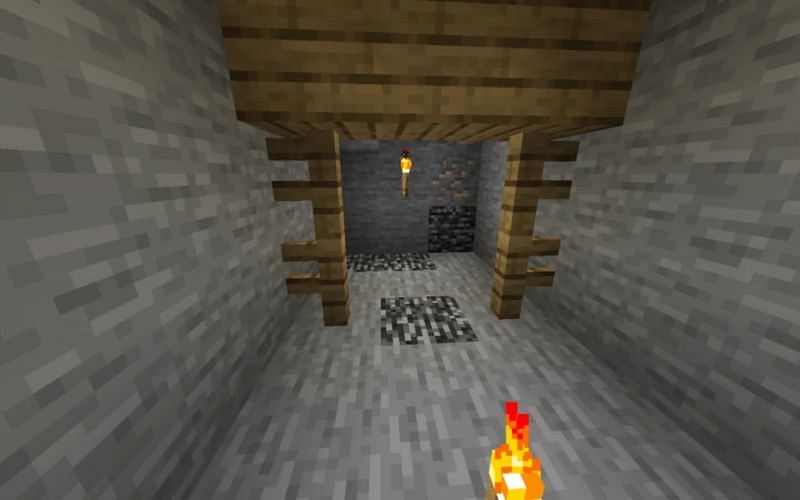 An image of a mineshaft that was generated at Minecraft&#039;s bedrock level (Image via Minecraft)