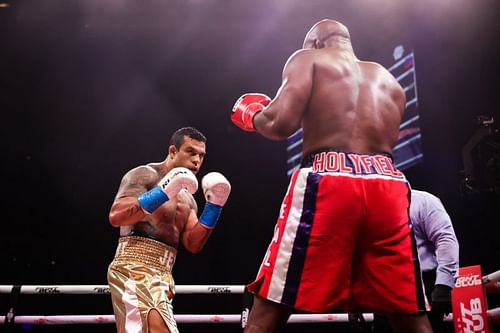 Evander Holyfield vs. Vitor Belfort (Photo via @TrillerFightClub on Twitter)