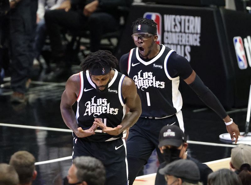 Patrick Beverley (#21) of the LA Clippers celebrates a three-point basket with Reggie Jackson (#1) during the 2021 NBA Western Conference Finals.