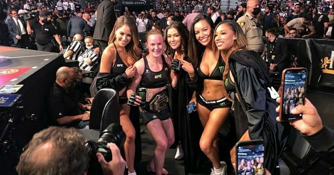 Valentina Shevchenko poses with the UFC ring girls in stance against Khabib Nurmagomedov's comments