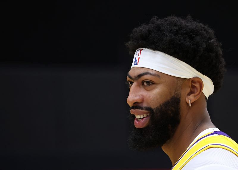 Anthony Davis #3 of the Los Angeles Lakers smiles as he walks to a press conference during Los Angeles Lakers media day at UCLA Health Training Center on September 28, 2021 in El Segundo, California.