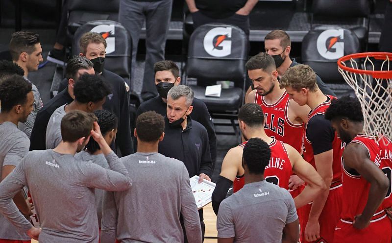 The Chicago Bulls form a team huddle during an NBA game