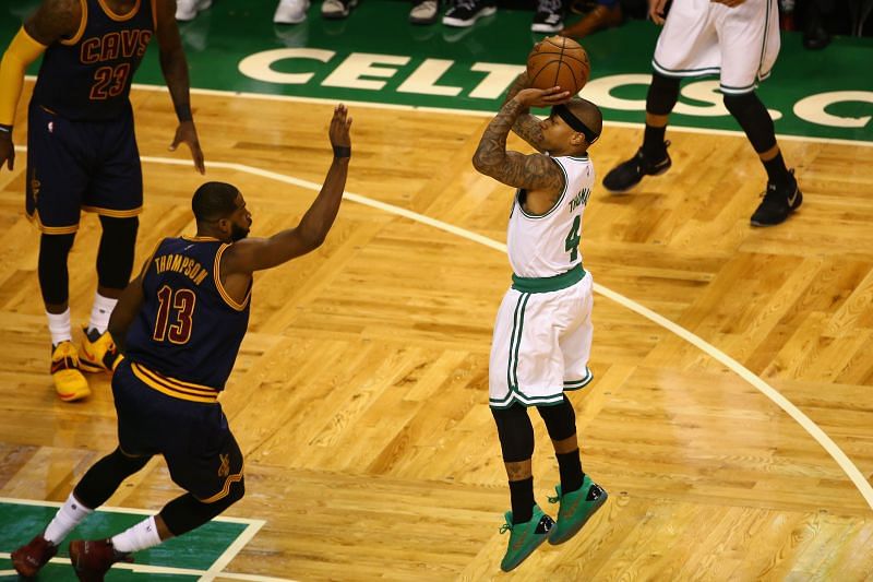 Isaiah Thomas shoots over Tristan Thompson during a Cleveland Cavaliers v Boston Celtics match