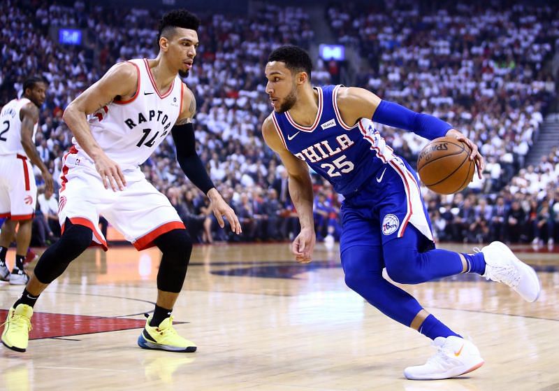 Ben Simmons #25 of the Philadelphia 76ers dribbles the ball as Danny Green #14 of the Toronto Raptors defends in the first half during Game Five of the second round of the 2019 NBA Playoffs at Scotiabank Arena on May 7, 2019 in Toronto, Canada.