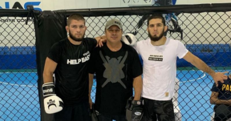 American Kickboxing Academy coach Javier Mendez (center) with his trainees Khabib Nurmagomedov (left) and Islam Makhachev (right) [Photo Credit: @akajav on Instagram]